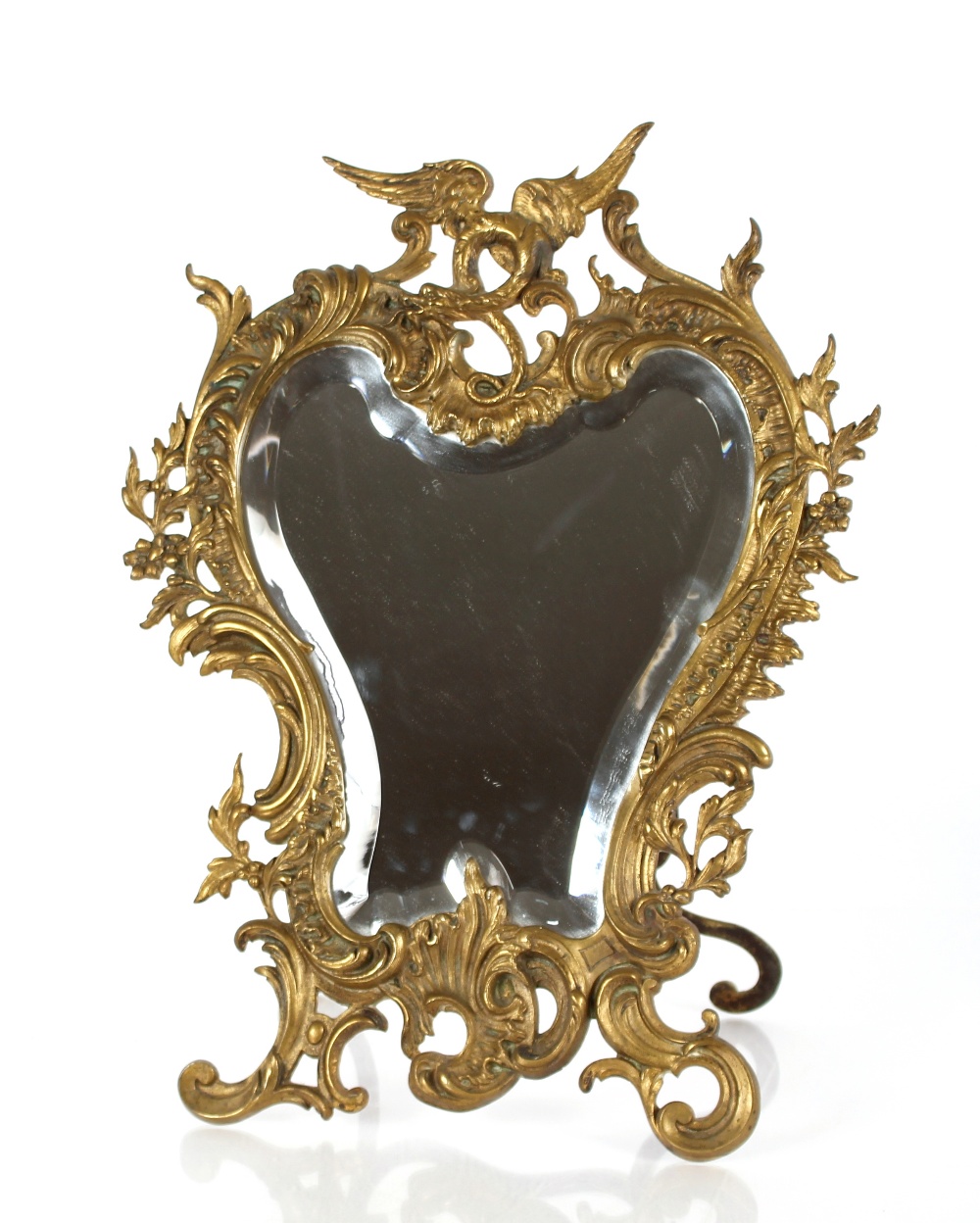 An ornate vintage small brass mirror, 44cm high