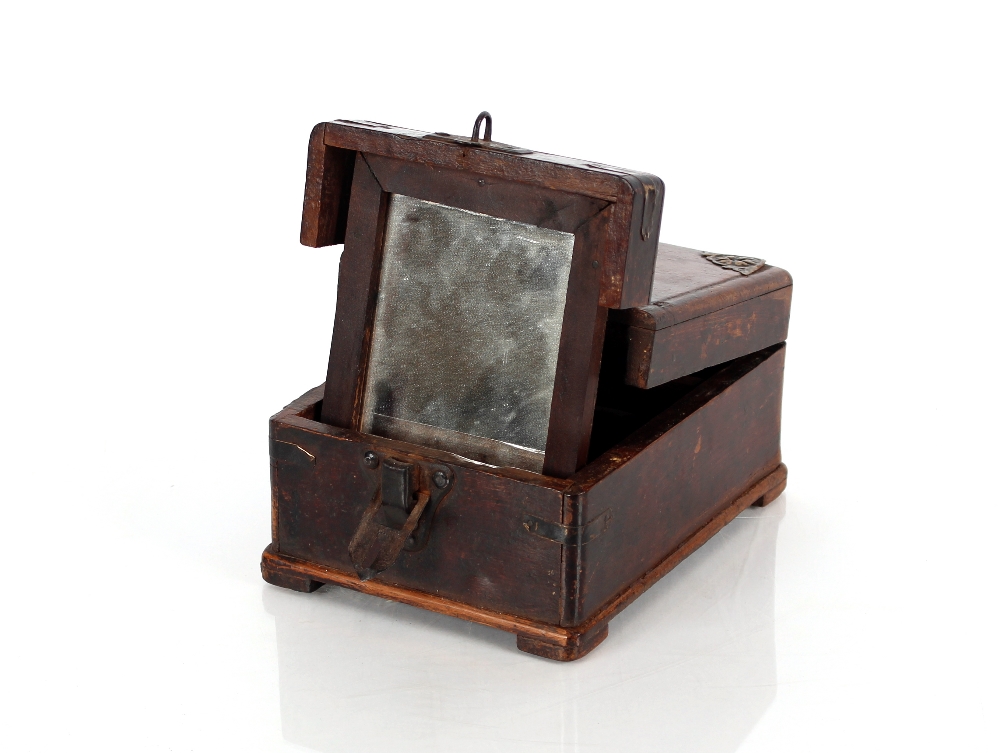 A Chinese wooden and metal bound dressing table box, the hinged lid opening to reveal a hinged - Image 2 of 2