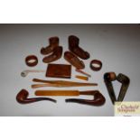 A box of miscellaneous Treen items including pipes