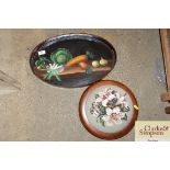 An oval painted tea tray and an embroidered foot s