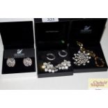 Three Swarovski Crystal cased ear-rings and pendan