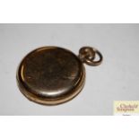 A gold plated Hunter pocket watch, cover with mono