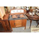 An Edwardian marble topped and tile back washstand