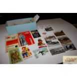 A box of miscellaneous loose post-cards