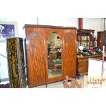 An early 20th Century mahogany combination wardrob