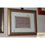 A small Victorian framed and glazed sampler