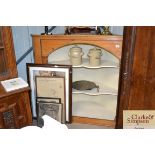 An antique stripped pine hanging corner cupboard