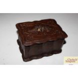 A Black Forest type musical trinket box