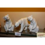 Two Lladro figures of seated Polar Bears; and a Ro