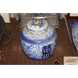 A Chinese blue and white temple type jar and cover