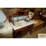 An Edwardian marble top and tile back washstand