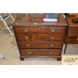 An 18th Century oak chest fitted four graduated dr