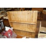 An antique pine plate rack