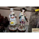 A pair of 19th Century German porcelain figures de