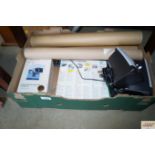 A box containing computer keyboard and speakers, U