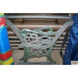 A pair of cast iron bench ends