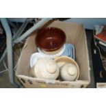 A box containing various dinnerware; two stoneware