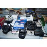 A large quantity of various digital cameras and ot