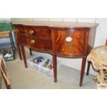 A Tomasville serpentine fronted sideboard