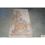 An approx. 5'1" x 2'7" Chinese style patterned rug