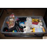 A box of various dog grooming items; dog toys etc