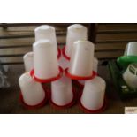 Ten plastic 5 litre poultry feeders