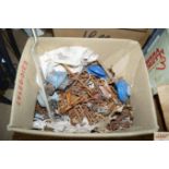 A box of nails, fittings and valves