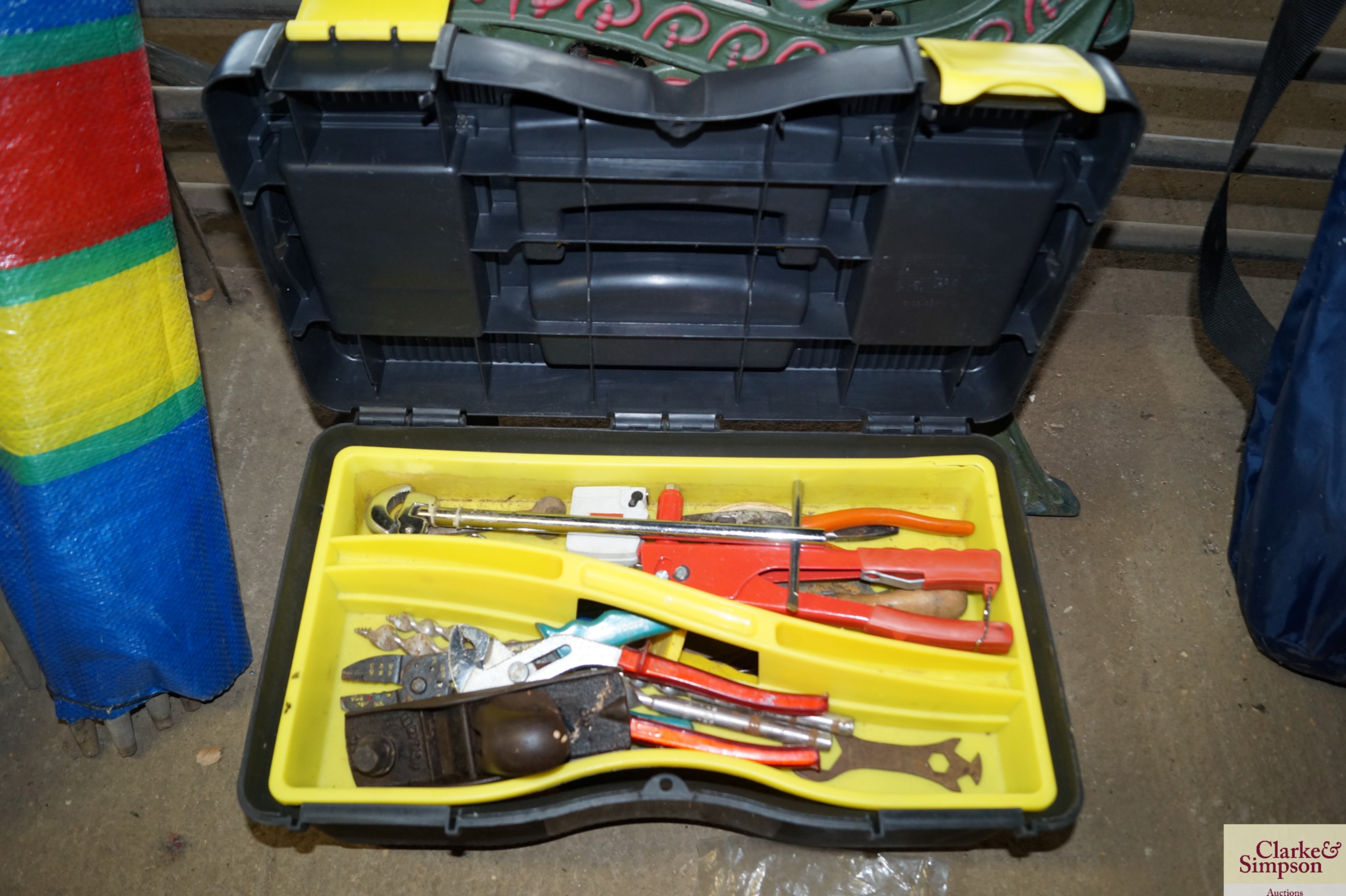 A plastic tool box and contents of various hand to