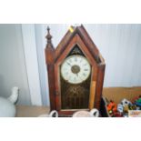 An American mantel clock of Gothic form