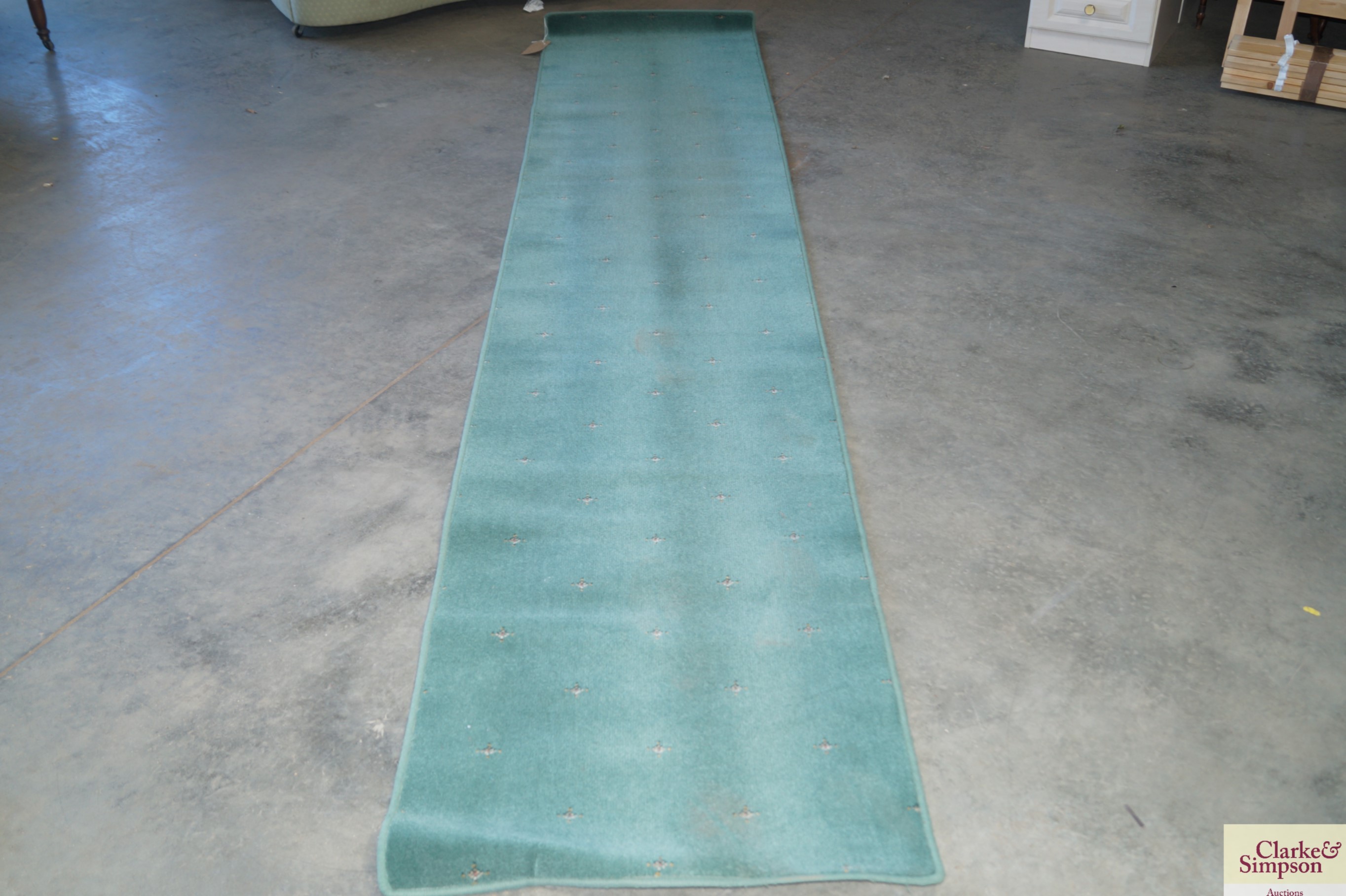 An approx. 11'6" x 2'4" patterned runner