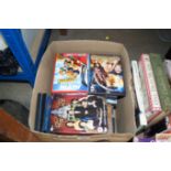 A box of various DVD's