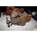 A Woden cast iron bench vice