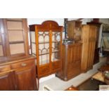 An Edwardian inlaid mahogany china display cabine