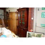 A Victorian mahogany bookcase on cupboard base