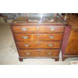 An 18th Century oak chest fitted four graduated dr