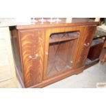 A mahogany drinks/display cabinet and a pine bedsi