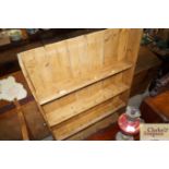 An antique pine plate rack