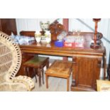 A Victorian mahogany pedestal sideboard