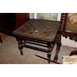 A brass mounted low occasional table with games bo