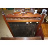 A late Victorian walnut framed over mantel mirror