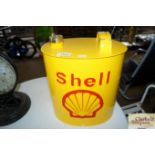 A reproduction Shell fuel can (220)