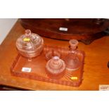 A coloured glass dressing table set