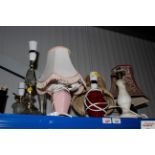 A quantity of various table lamps