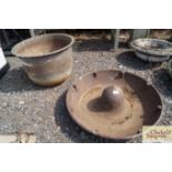 A circular pig trough; and a galvanised copper