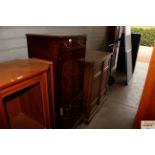 A reproduction mahogany Hi-fi cabinet