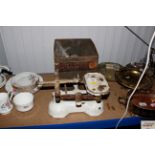 A set of kitchen scales and various weights