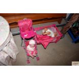 A doll's push chair; high chair and cot including