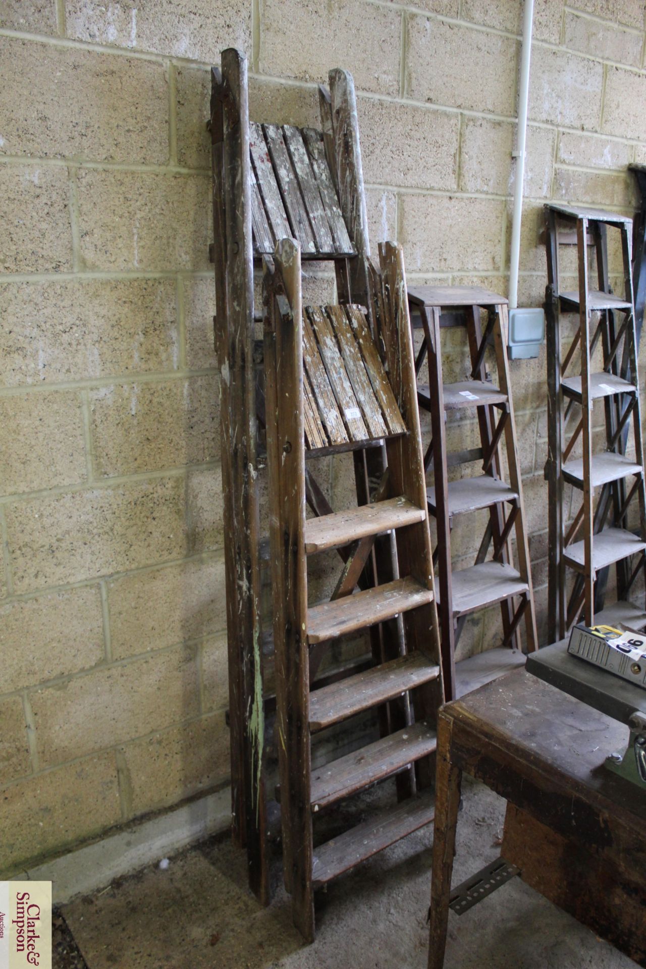 Two sets of step ladders