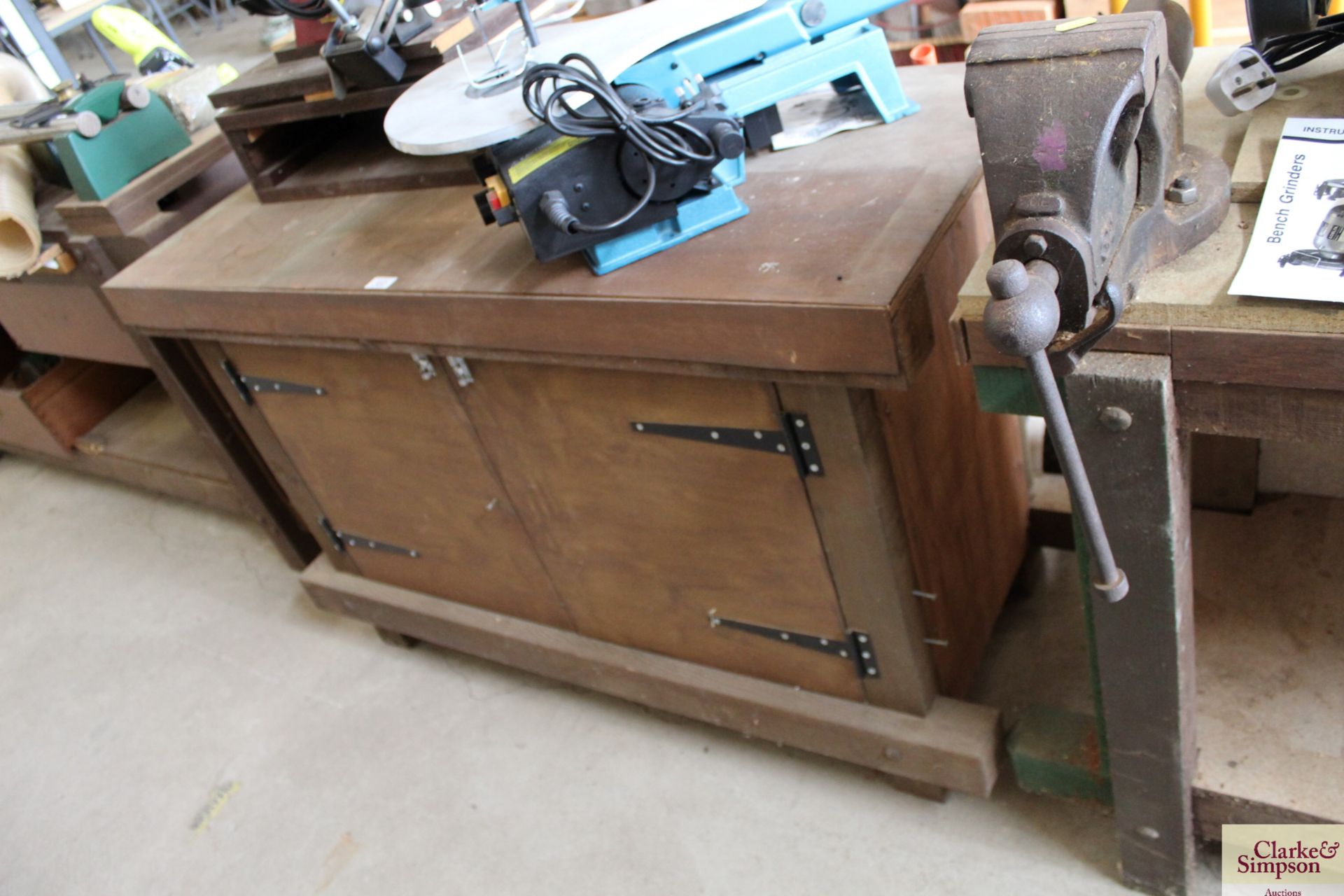 Approx. 1.2m wooden workshop cabinet with storage below.