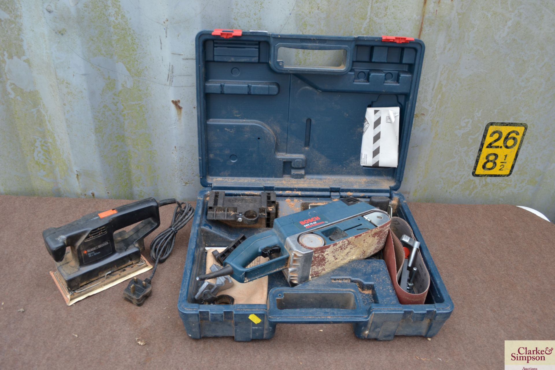 Bosch Professional GBS 75AE 240v belt sander in case and a Black & Decker 240v orbital sander.